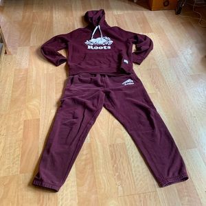 Roots tracksuit/ burgundy/ pants are slightly more faded then the hoodie/